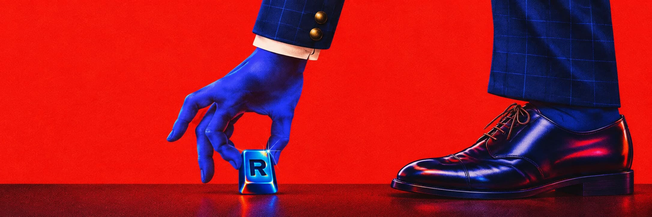 A hand in a blue suit presses a glossy blue R keycap on a red table.